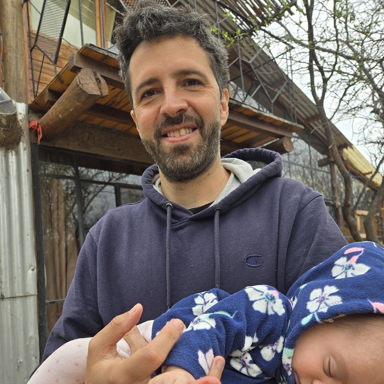 Ricardo meeting his newborn niece in San Marcos Sierras